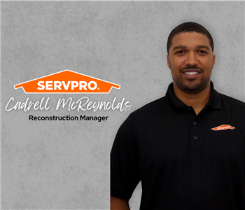 Servpro employee, man in black polo